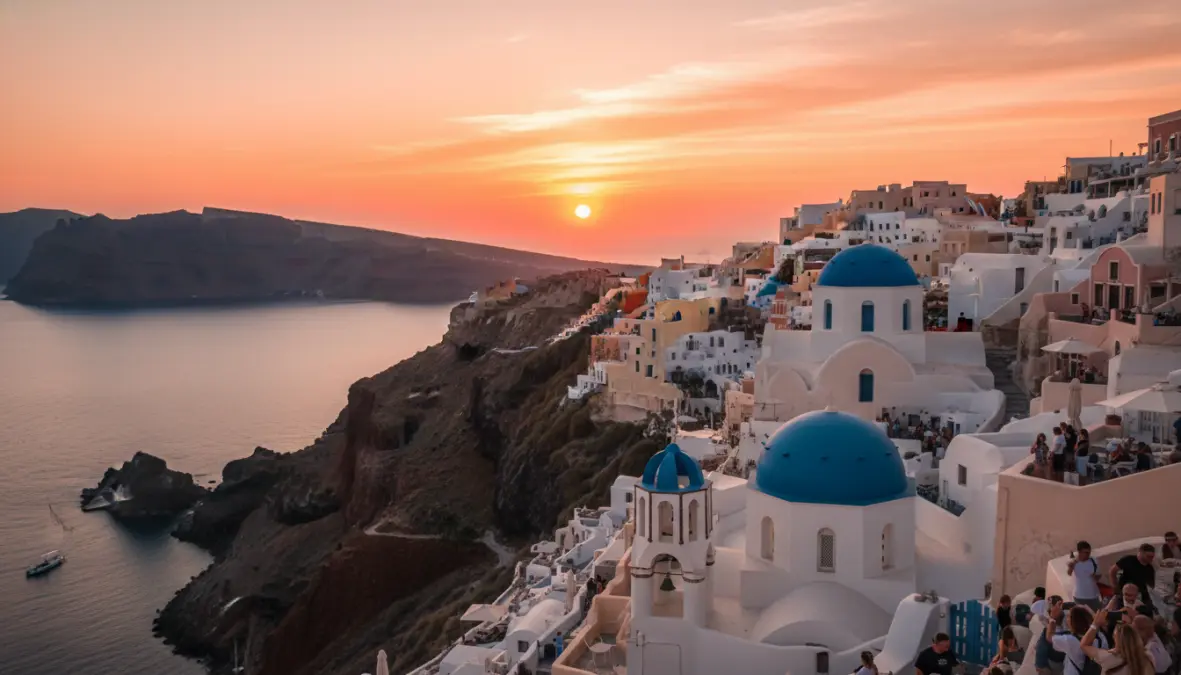 Oia sunset views in Santorini showing the caldera cliffs and white buildings