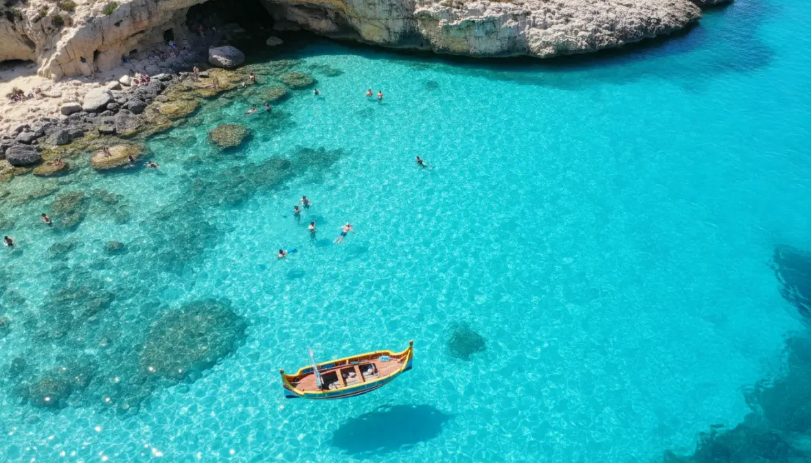 Blue Lagoon Comino Malta with turquoise waters and traditional boat